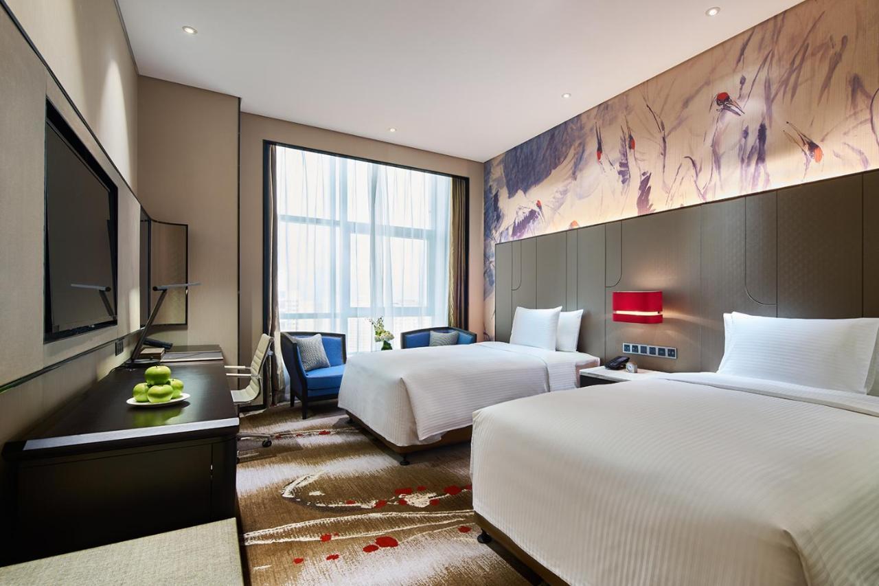 Wanda Realm Qiqihar Hotel ภายนอก รูปภาพ
